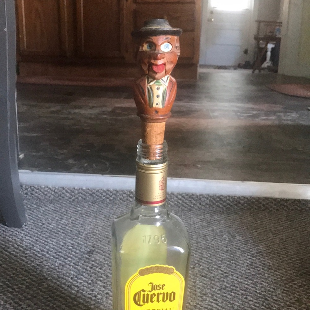 Hand-carved bottle stoppers by Anri